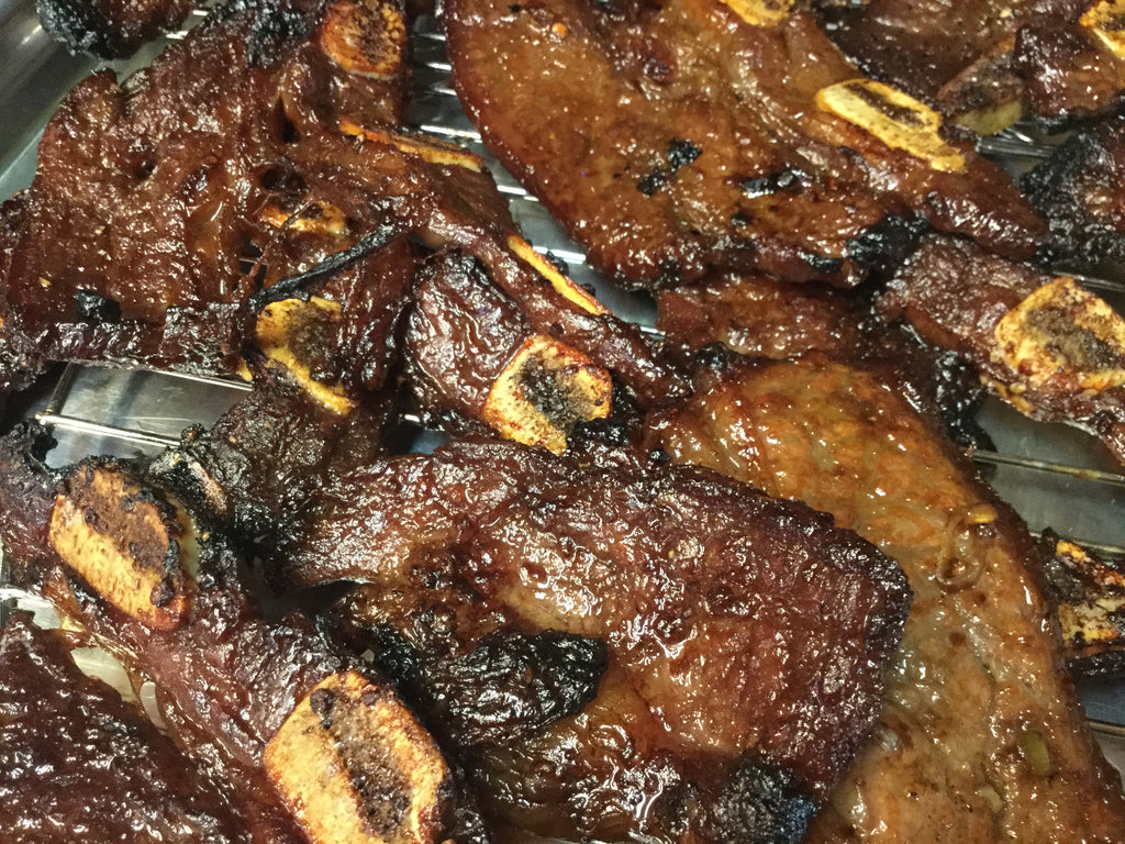 Photo of asian style cooked flanken ribs in a pan